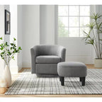 Sillón giratorio decorativo de pana gris con otomana