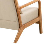 Sillón tapizado en tela con patas de madera