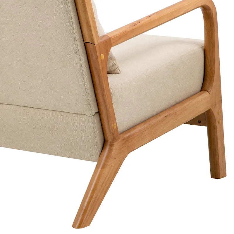 Sillón tapizado en tela con patas de madera