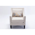 Sillón de tela de lino con detalles de tachuelas y patas de madera maciza