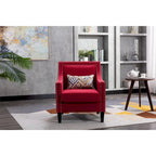 Sillón de tela de lino con detalles de tachuelas y patas de madera maciza