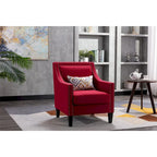 Sillón de tela de lino con detalles de tachuelas y patas de madera maciza