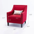 Sillón de tela de lino con detalles de tachuelas y patas de madera maciza