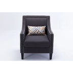 Sillón de tela de lino con detalles de tachuelas y patas de madera maciza